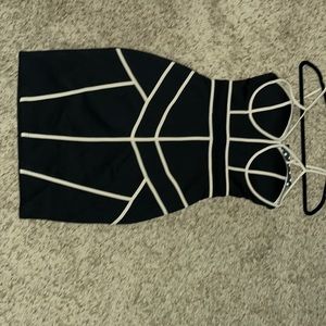 Girl in mind black and cream dress never worn size medium from forever 21